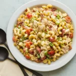 Club Chicken Pasta Salad with rotisserie chicken, bacon, tomatoes, cheese, avocado, and pasta tossed in creamy dressing.