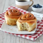 Warm buttermilk cinnamon rolls with brown sugar filling, fresh from the oven.