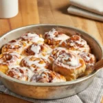 Easy cinnamon rolls — golden rolls with brown sugar walnut filling and light glaze.