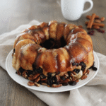 Honey-glazed Bundt pan cinnamon buns baked from frozen rolls with caramelized brown sugar topping.